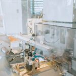 Close-up of advanced machinery in a modern laboratory setting, highlighting technology and industry.
