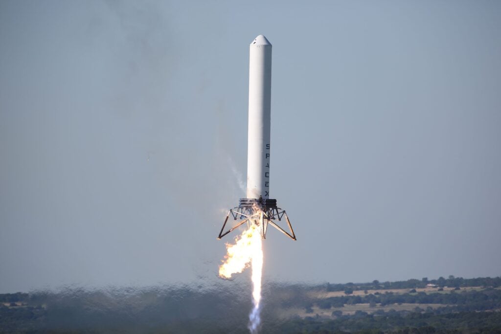 A powerful rocket launches into the sky, showcasing advanced space technology.